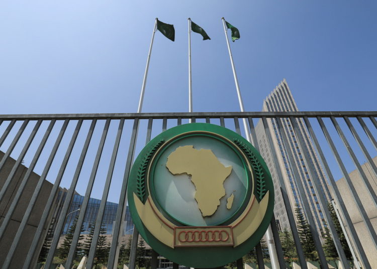 The African Union logo is seen outside the AU headquarters building in Addis Ababa, Ethiopia, November 8, 2021. REUTERS/Tiksa Negeri