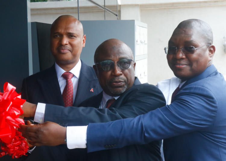 L-R: TAJBank Limited’s Managing Director/CEO; Mr. Hamid Joda; the bank’s board Chairman, Alhaji Tanko Gwamma; and the Executive Director, Mr. Sherif Idi; in joyous mood as the Chairman cuts the tape to formally open the new branch in Wuse 2, Abuja, recently