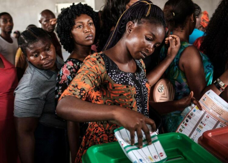 woman-casts-ballot-nigeria