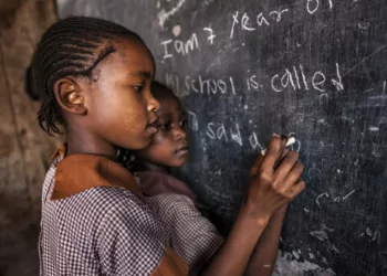 African little girls are learning English language, orphanage in Kenya