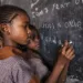 African little girls are learning English language, orphanage in Kenya