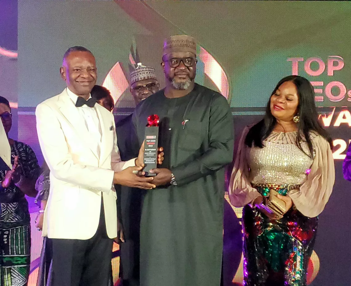 L-R: Publisher, BusinessDay Newspaper, Mr. Frank Aigbogun, presenting award to the managing director/chief executive officer, eTranzact Plc, Mr Olaniyi Toluwalope in recognition of the company’s stellar performance on the Nigerian Stock Exchange, along with  him, general council/group head, legal, eTranzact Plc, Eme Godwin, during the Business Day Top 25 CEOs Award in Lagos, recently