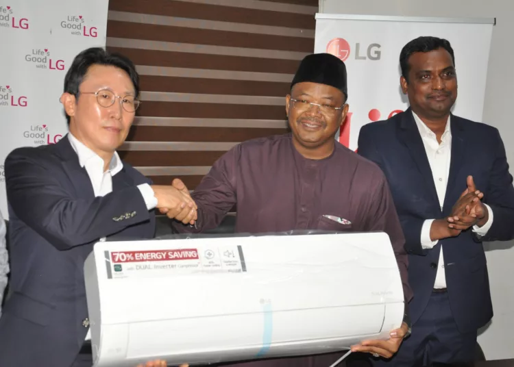 L-R: Managing director, LG Electronics West Africa Operations, Mr. Youn Kim; medical director, Federal Medical Center, Abuja, Prof. Saad Ahmed, and head, Corporate Marketing, LG Electronics West Africa Operation, Mr. Hari Elluru, during LG Electronics CSR Initiative donation of new Gencool Air Conditioning Units, inverter linea Refrigerator, Twin Tub Washing Machine Mosquitos Nets, Diapers and Baby Kits to the management of the Federal Medical Center, Abuja today.