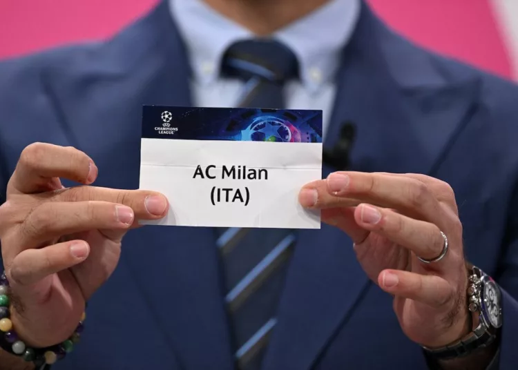 Champions League's ambassador Turkish former footballer Hamit Altintop shows the paper slip of AC Milan during the draw for the round of 16 of the 2022-2023 UEFA Champions League football tournament in Nyon on November 7, 2022. (Photo by Fabrice COFFRINI / AFP) (Photo by FABRICE COFFRINI/AFP via Getty Images)