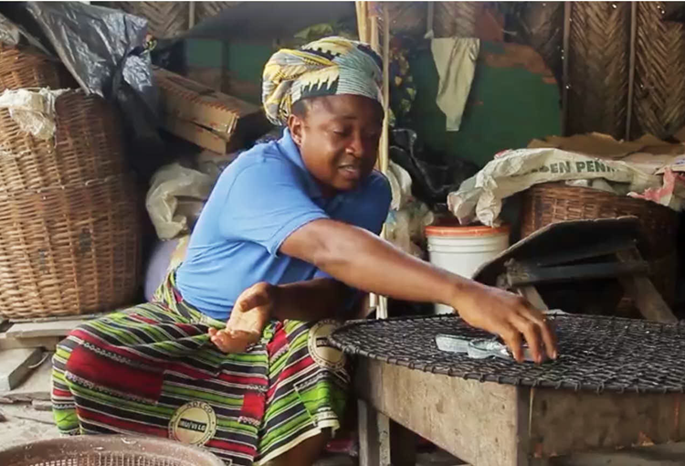 A rural woman tends to her age-old craft