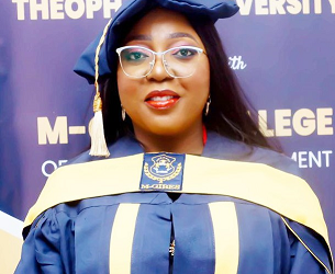McEnies CEO Gets Honorary Doctoral Degree, Business Leader Award