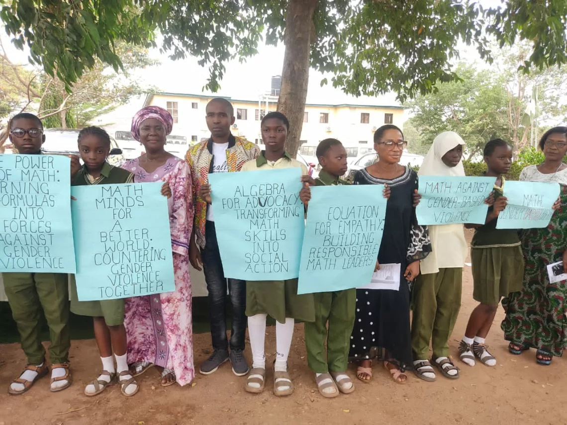 Convener, Real Life Mathematics, Mr. Joshua Ebeazor (4th from left) with the principal and students of Junior Secondary School, Abuja, during an event at the school, recently