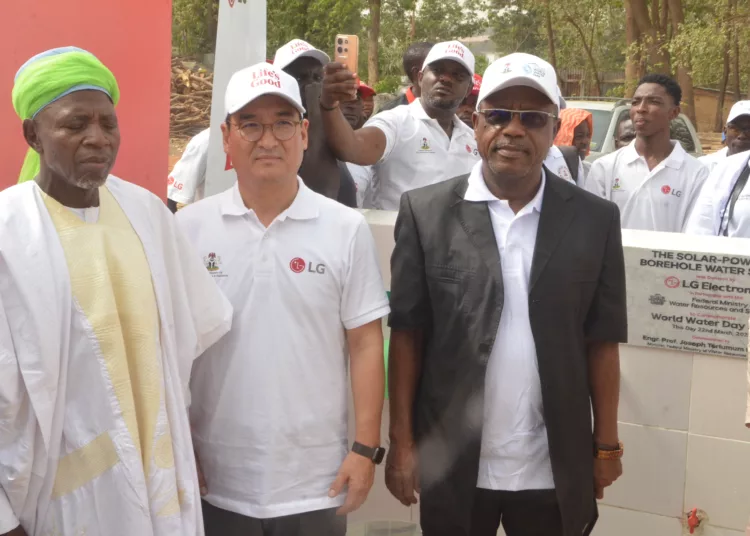 L-R:  District Head, Garki, Chief Tanko Zekeri; Managing Director, LG Electronics West Africa, Mr. Hyoung Sub Ji, and Director, Water Resources Projects and Planning, Federal Ministry of Water Resources and Sanitation, Engr. Ade Adenopo at the commissioning of donated Solar-powered Borehole by LG Electronics to Durumi 3 Community in Abuja recently