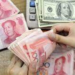 Yuan Weakens To 7.1418 Per Dollar Amid Market Shifts